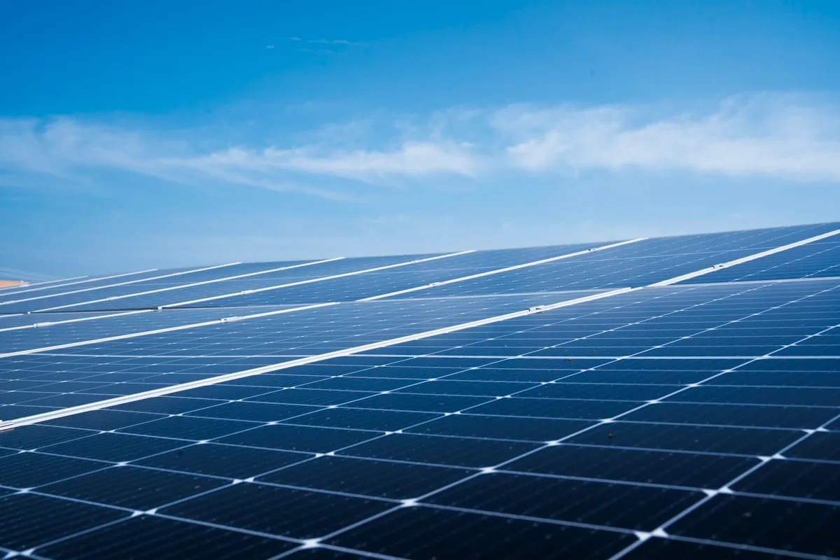 Solar panels mounted on a rooftop under clear sky