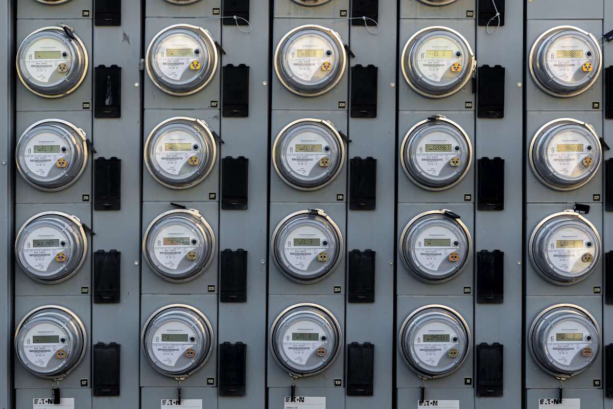 A black and white residential electricity meter